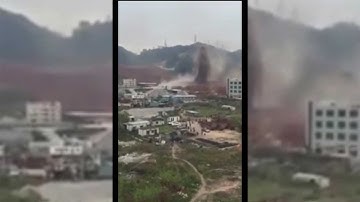 China landslide swallows 33 buildings, 91 missing - Watch video