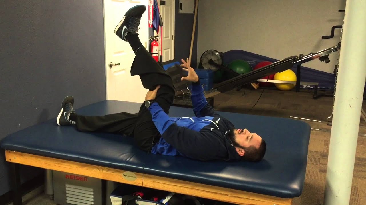 Active hamstring stretch. Athlete flexes hip up to 90 and clasps
