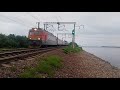 Электровоз ЭП1-240 с фирменным поездом №005Э &quot;Океан&quot; Владивосток-Хабаровск вечером на Транссибе.