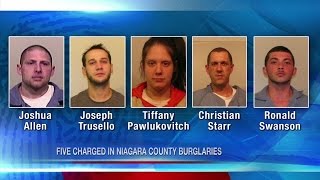 Five arrested for string of burglaries last year