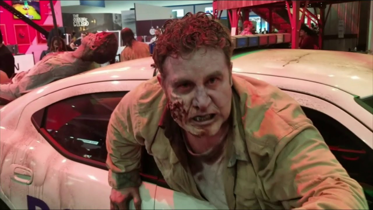 Creature Actor Jamie Avera Performs As A Walking Dead Zombie