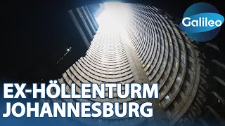 Download Lagu Vom vertikalen Slum zum Hoffnungsträger: Leben im Ex-Höllenturm von Johannesburg MP3