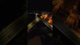 Man Basejumps from a Building onto the Street