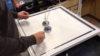 Angular Collision of Two Masses