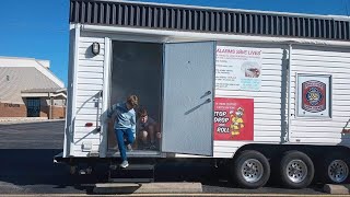 Fire department teaching students life-saving techniques