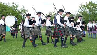 Mass pipe band at Antigonish Highland Games for boomervoice