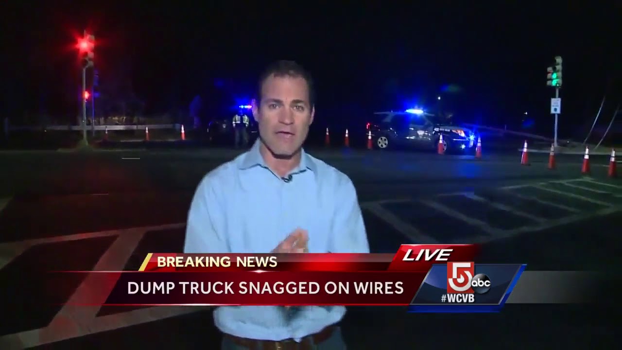 Dump truck brings down power lines - YouTube