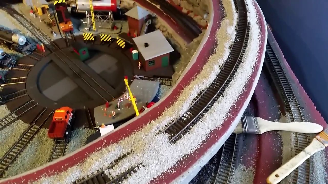 23. HO scale train road bed work, putting ballast on my tracks in glue
