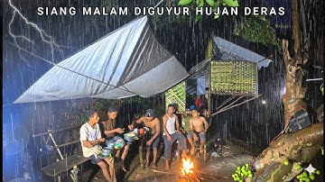 Heavy rain, camping, fishing, and crowds, spending the night by the river, relaxing with the sound