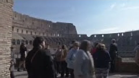 Two American tourists face charges for aggravated damage to a monument after carving their initials