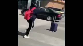 Stan Twitter: Girl Chasing A Flying Suitcase