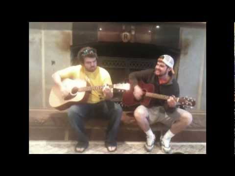 Dan & Reid singing and playing guitar