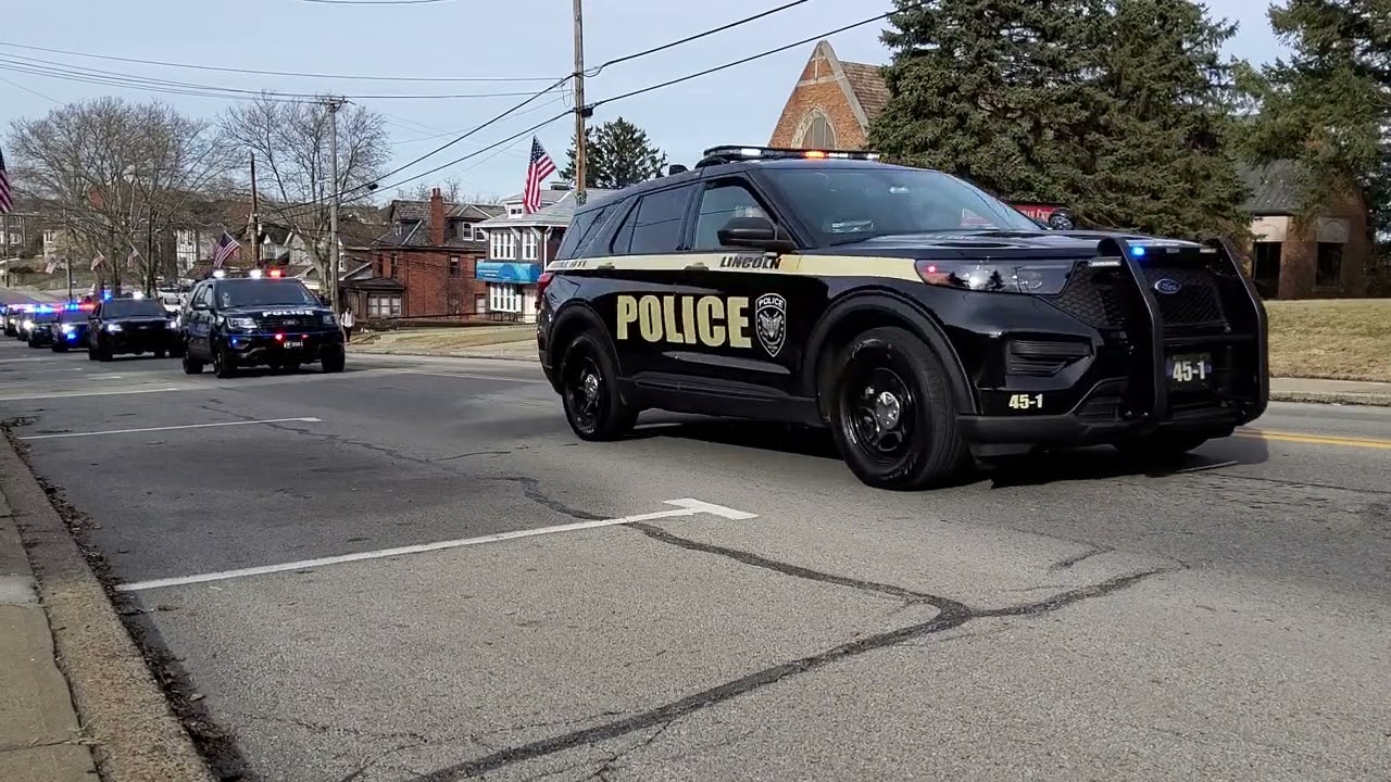 Funeral procession for police office Sean Sluganski (Feb 14, 2023) of McKeesport, Pennsylvania.