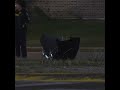 Truck ends up on car during fatal crash