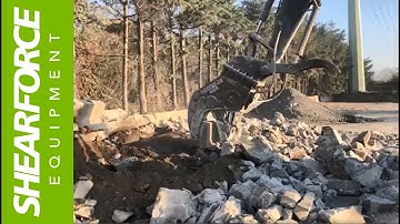 ShearForce Fixed Pulverizer at Work Crushing Concrete Barriers