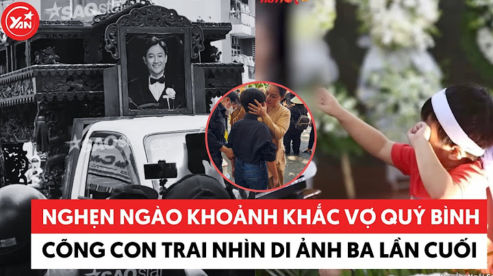 Nghẹn ngào hình ảnh vợ Quý Bình cõng con trai nhìn di ảnh ba lần cuối
