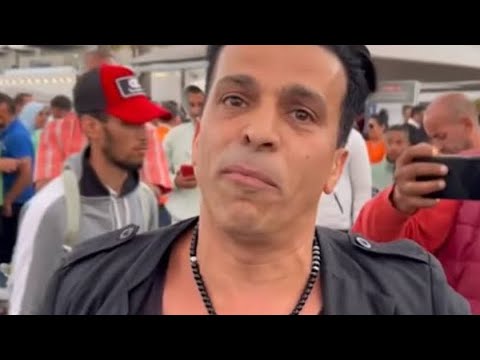 شاهد تحفيل ورقص لاعبي الاهلي بالكأس أمام المشجع الزملكاوي (الألماني) في المطار ومشادة بينهم
