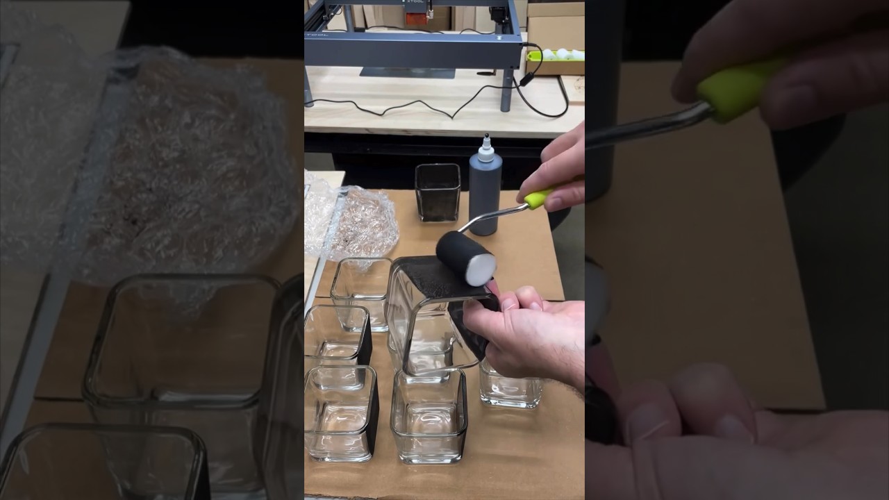 Adding some black water based paint to these glasses so I can engrave them on the laser.