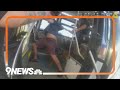 New video shows police shooting armed man on Denver bus image