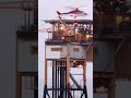 Helicopter landing on oil rig.