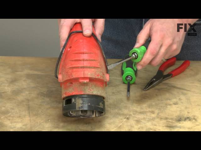 How to Replace the Lock Button on a Black and Decker CST1200 String Trimmer  (Part # 394261-00) 