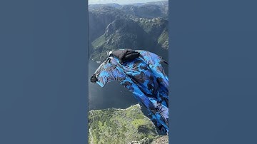 Wingsuit base jump off norway cliff
