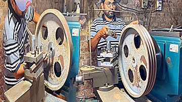 Amazing process of Boring big 3v belt pulley on Lathe machine in local factory .