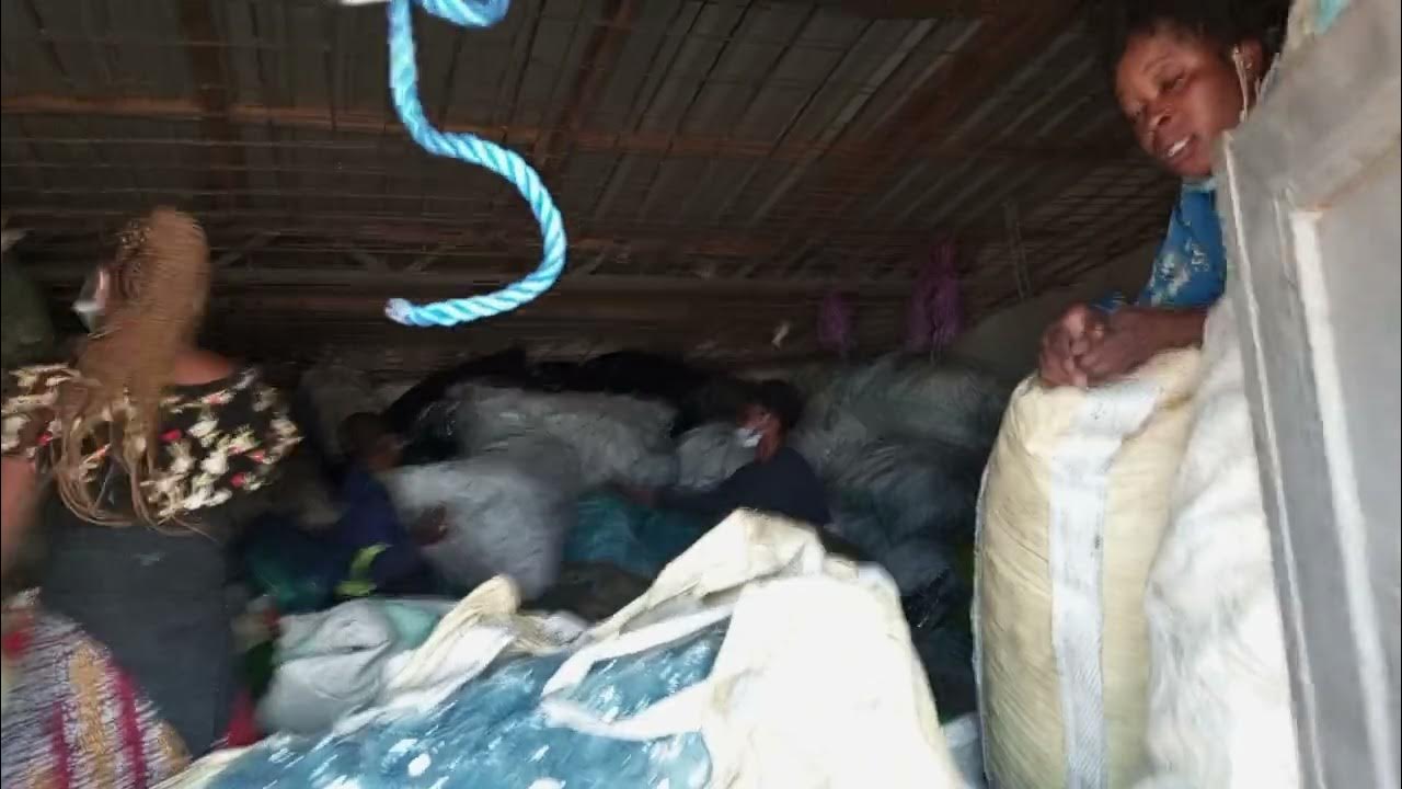 Zukani Action Zambia Champions packing different plastic materials