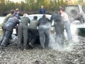 Pushing a car on the ferry