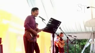 Lawrence Wong performing at the garden party at the Istana