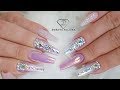 Pink nails with Swarovski Crystals, sugar nail art and Aurora chrome pigment. Gel ombre nail art