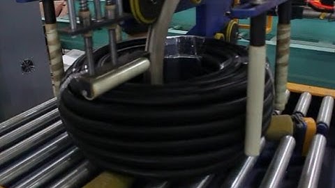 Automatic pipe and hose coil packging line