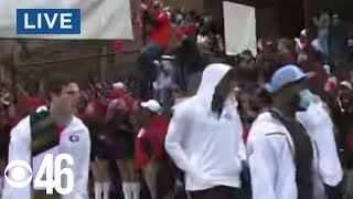 The Bulldogs make their way down the Dawg Walk as fans cheer them on