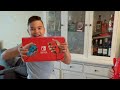 MY SON OPENING HIS BIRTHDAY GIFT NENTINDO SWITCH WITH SUPER MARIO DELUXE AND JUSTDANCCE /NIKE