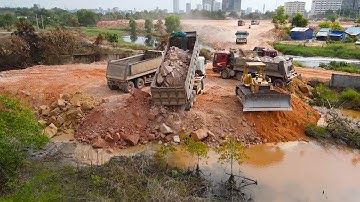 Really Excellent!! Landfill Team Bulldozer , Dump Truck in Operation Push, Moving Stone  into Water