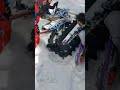 Starting snowbike with snowmobile