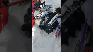 Starting snowbike with snowmobile