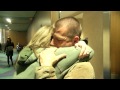 Soldier surprises wife at Portland airport