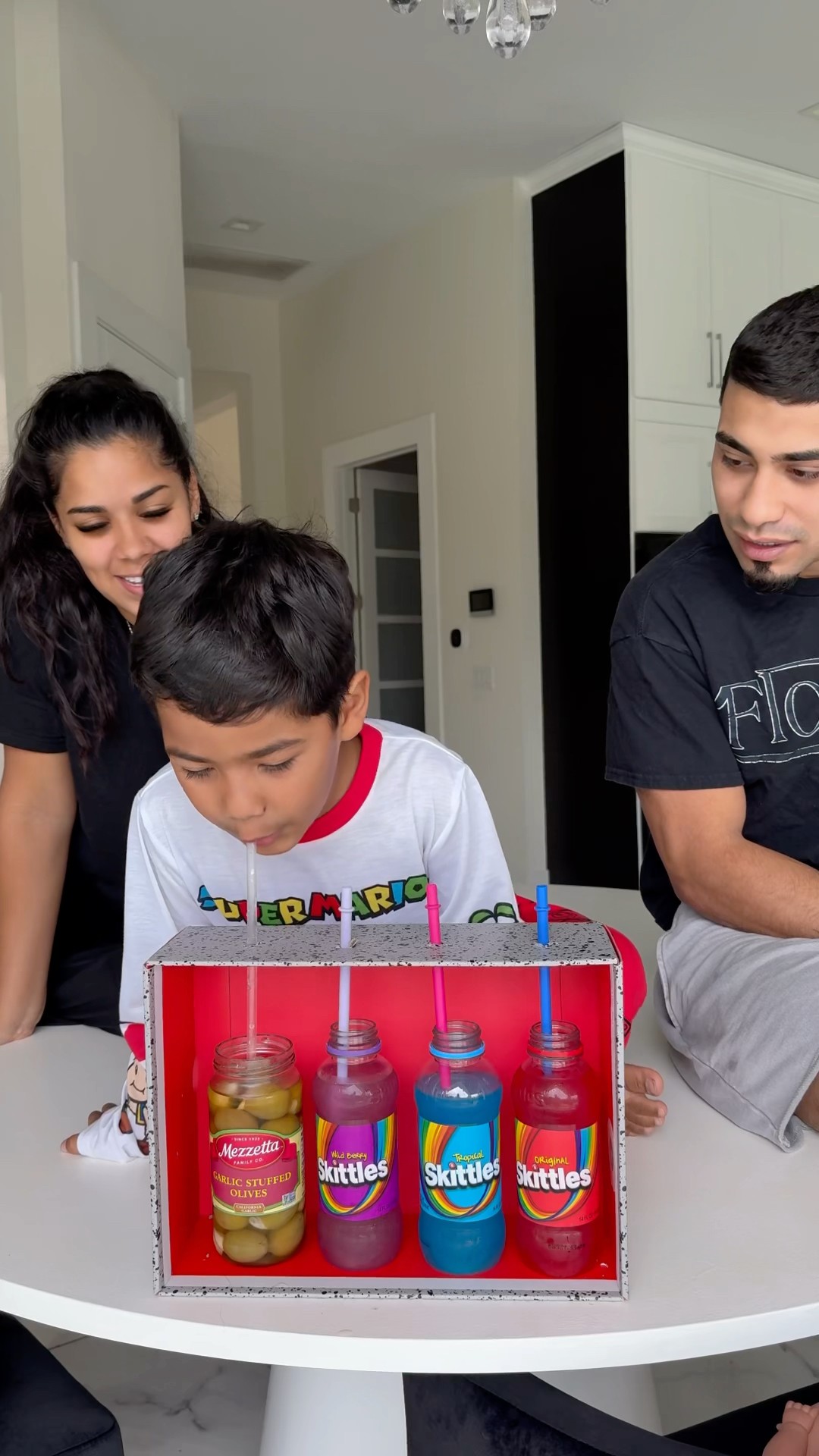 Mom and dad prank son with skittles drinks #shorts