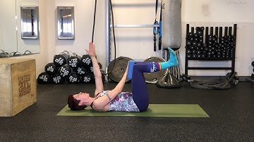 Dead Bug with yoga block | Reimagym.com