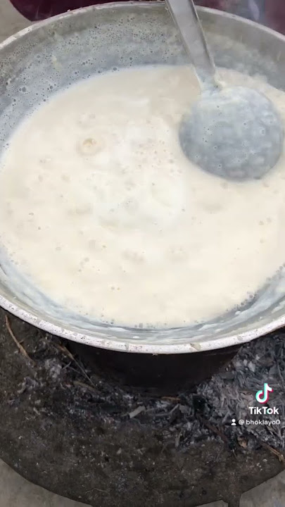Making khuwa (Nepali food)