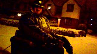 Old Man on a Mobility Scooter in The Snow
