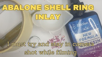 First time trying to fill an inlay ring. Using abalone shell and UV resin