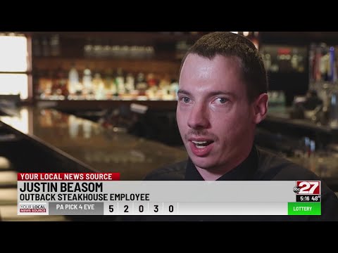 Autistic Outback Steakhouse employee celebrates successful employment in the Midstate
