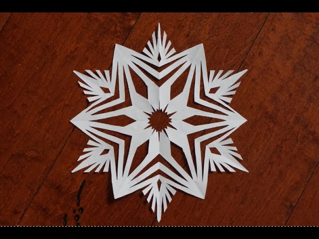 Stencil Snowflakes on Windows with Temporary Snow Frost