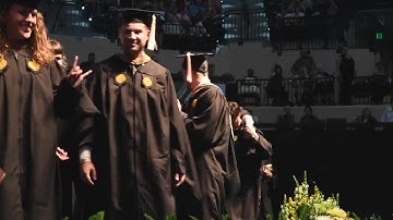 VIDEO: Graduating student rises from wheelchair, walks across stage