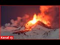 Snowy Mount Etna roars into action spurting lava into night sky