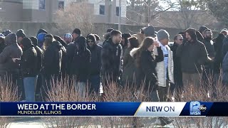 Marijuana users line up for hours to buy legally in Illinois