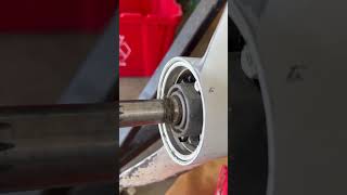 Outboard Motor Lower Unit Gearcase Maintenance - Checking for line around the propeller shaft.
