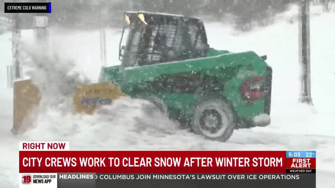 City crews work to clear snow after winter storm - YouTube